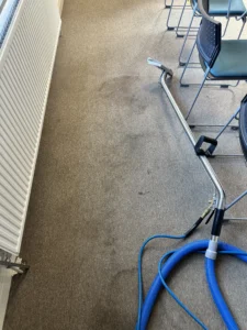 Office carpet stains and spillages being deep cleaned 